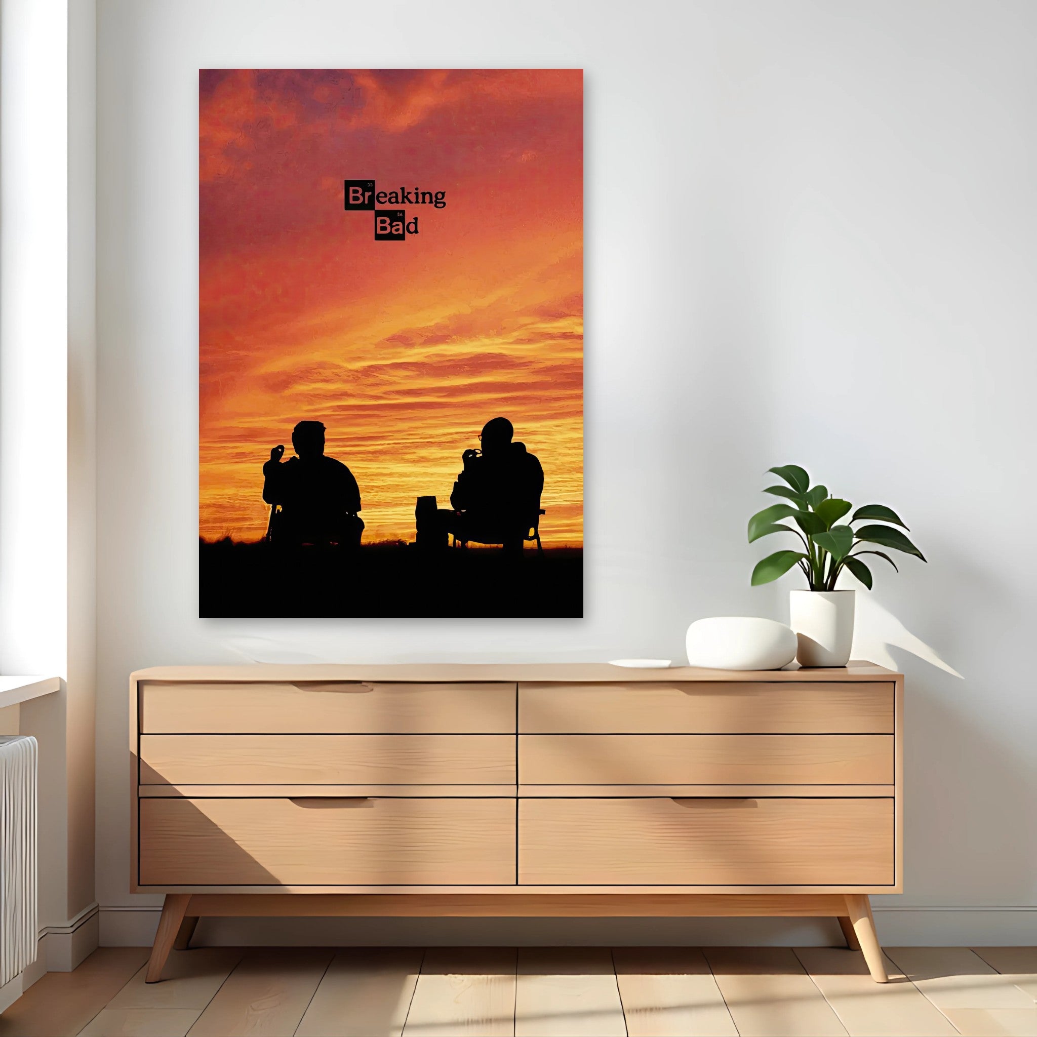 Breaking Bad poster featuring silhouettes of two characters against a vibrant sunset, perfect for fans of the series.