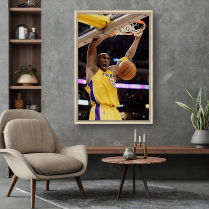Kobe Bryant iconic slam dunk framed canvas print in modern interior setting, showcasing basketball greatness.