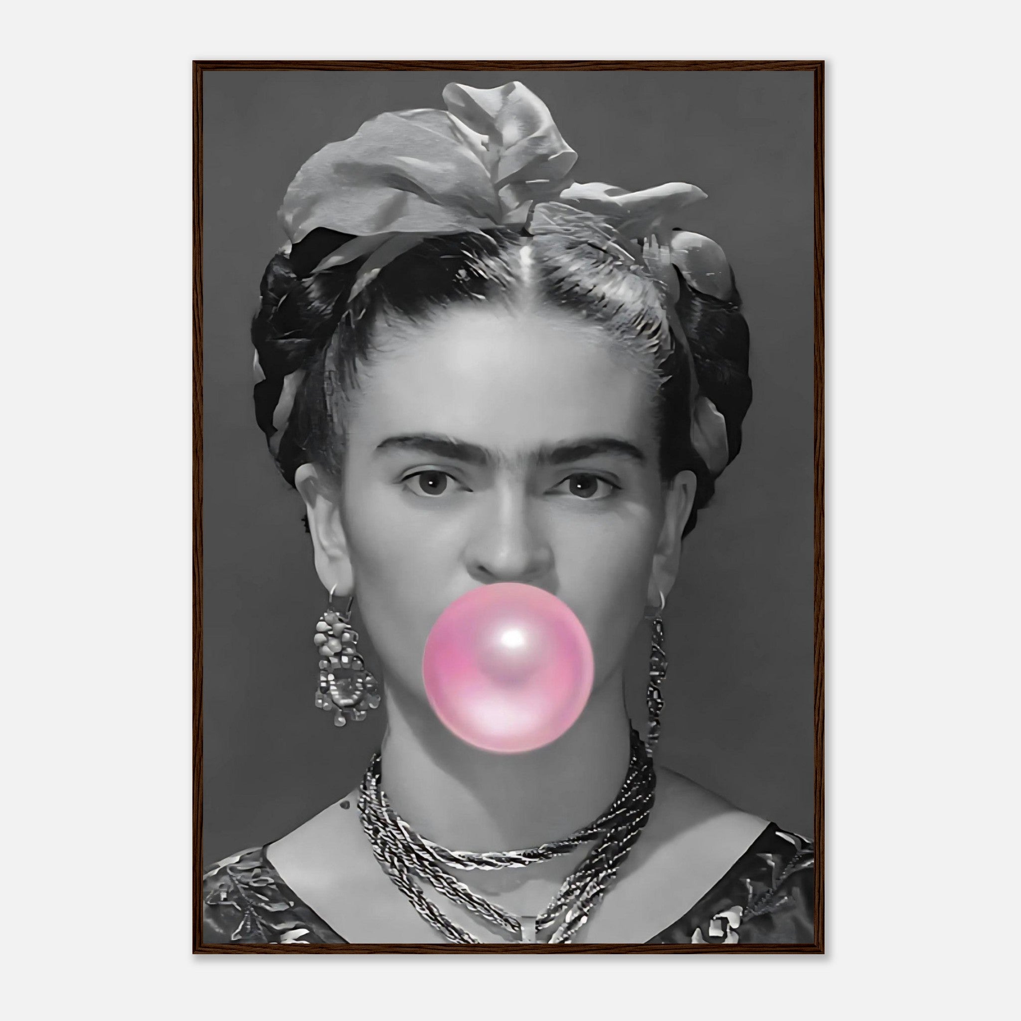 Frida Kahlo framed print featuring a black and white portrait with pink bubble gum, adding a whimsical touch to any decor.