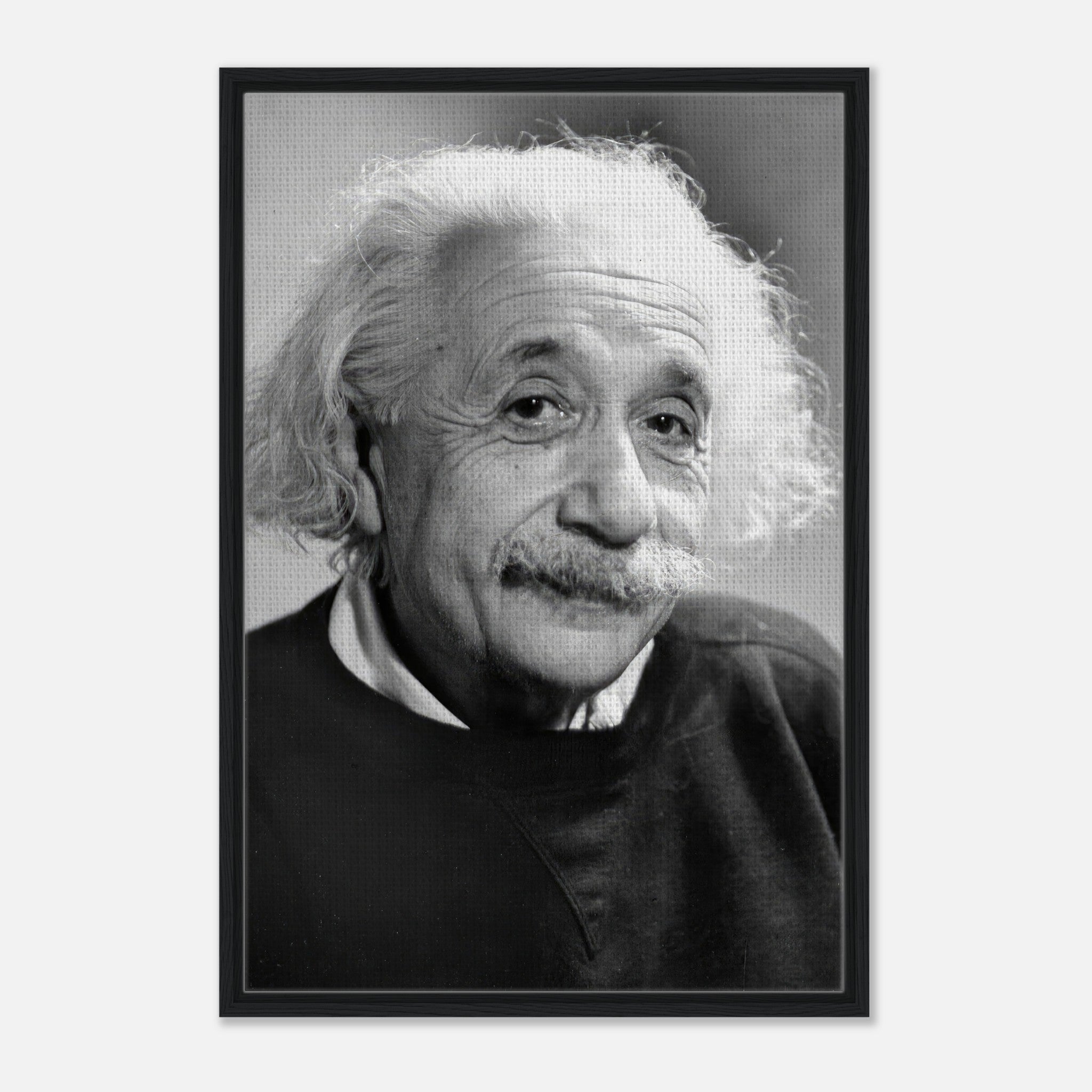 Framed canvas print of Albert Einstein, 1946 black and white portrait showcasing his thoughtful expression.