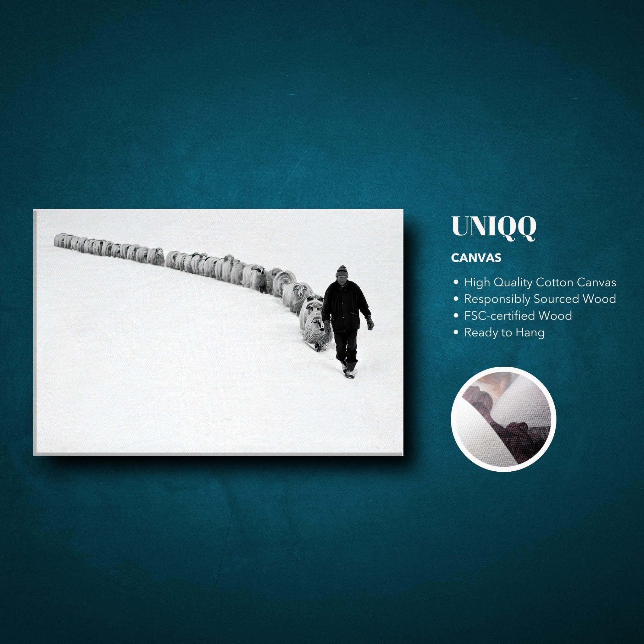 Black-and-white canvas print of a shepherd guiding his flock through a serene, snowy landscape.