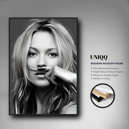 Kate Moss Mustache Framed Print in modern wooden frame, showcasing a striking black-and-white portrait with playful elegance.