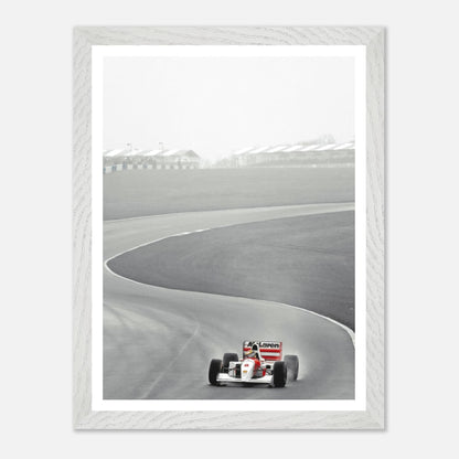 1988 Ayrton Senna McLaren MP4/4 vintage framed art capturing Formula 1 racing action on the track.