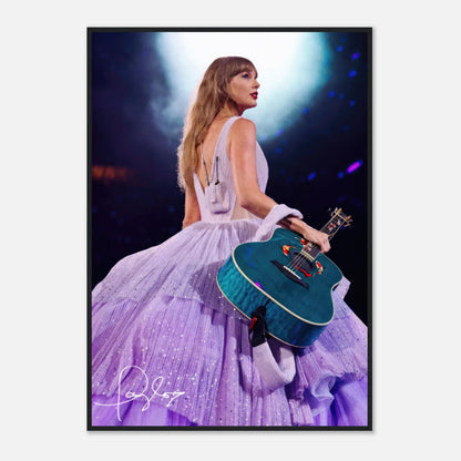 Taylor Swift Framed Poster featuring her in a lavender gown with a guitar, capturing her iconic stage presence.