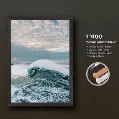 Big Wave Surfing Vintage Framed Print showcasing a surfer riding a massive wave, capturing ocean beauty and thrill.