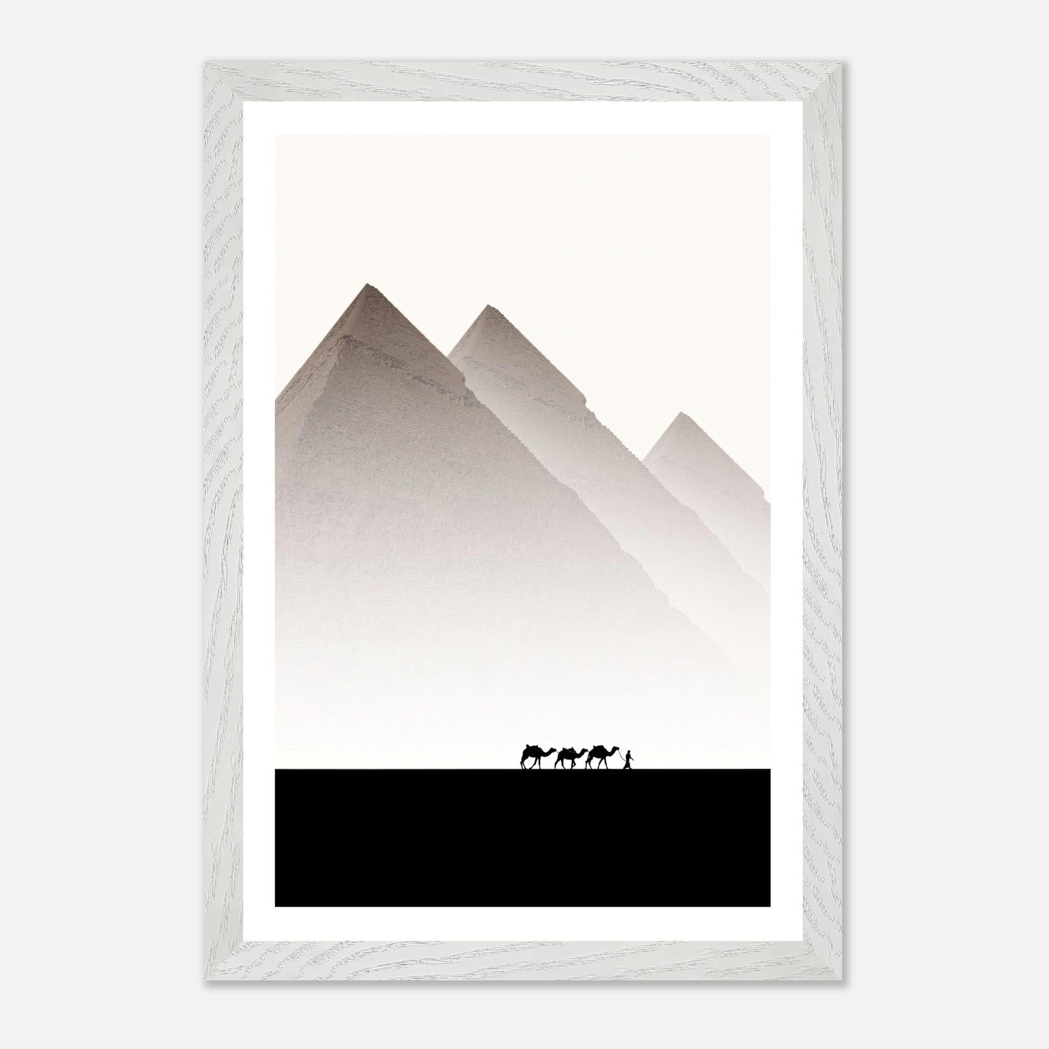 Framed Giclée fine art of the Pyramids of Giza with camels, showcasing minimalist design and muted tones.