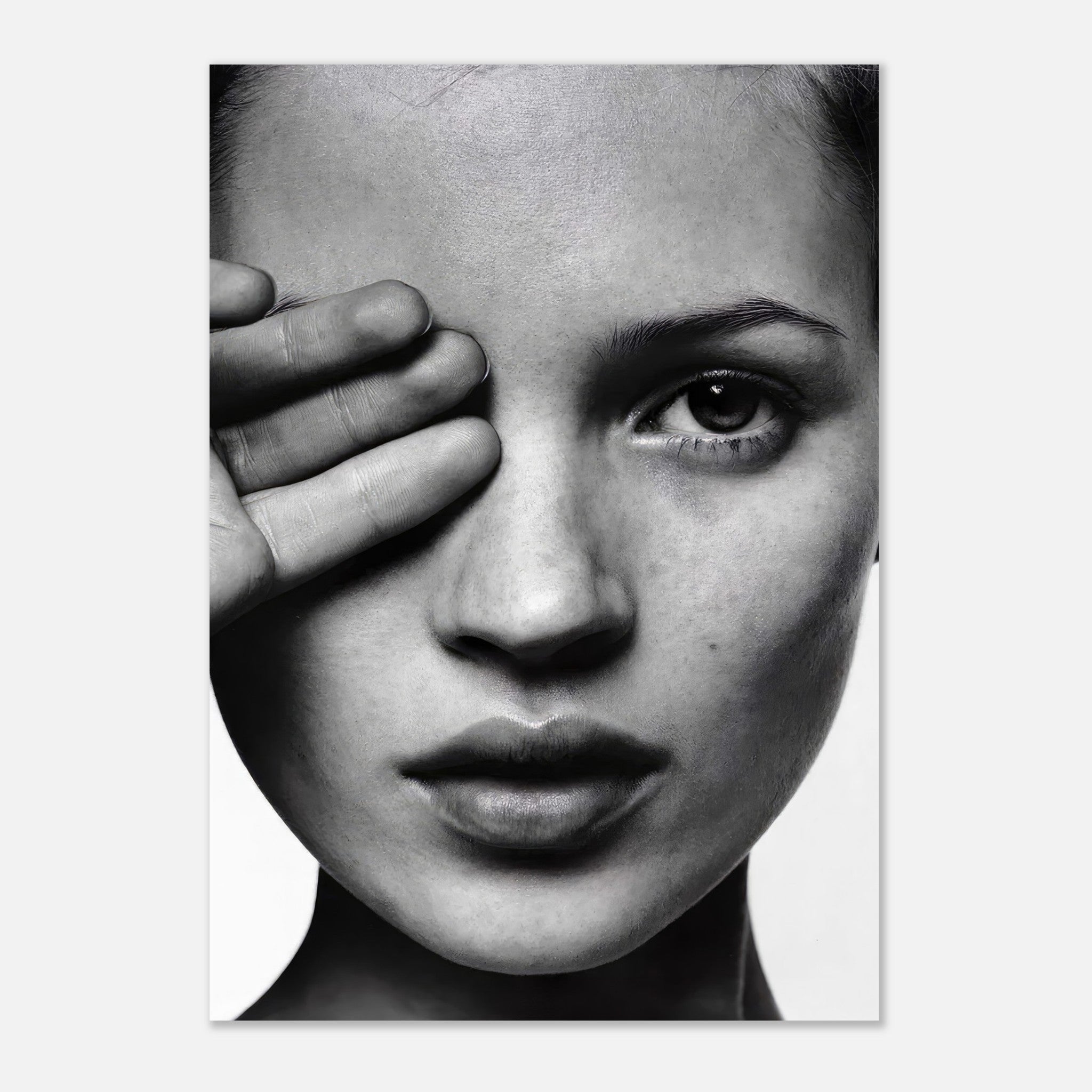 Black and white photography poster featuring a woman covering one eye, showcasing artistic facial expression and detail.