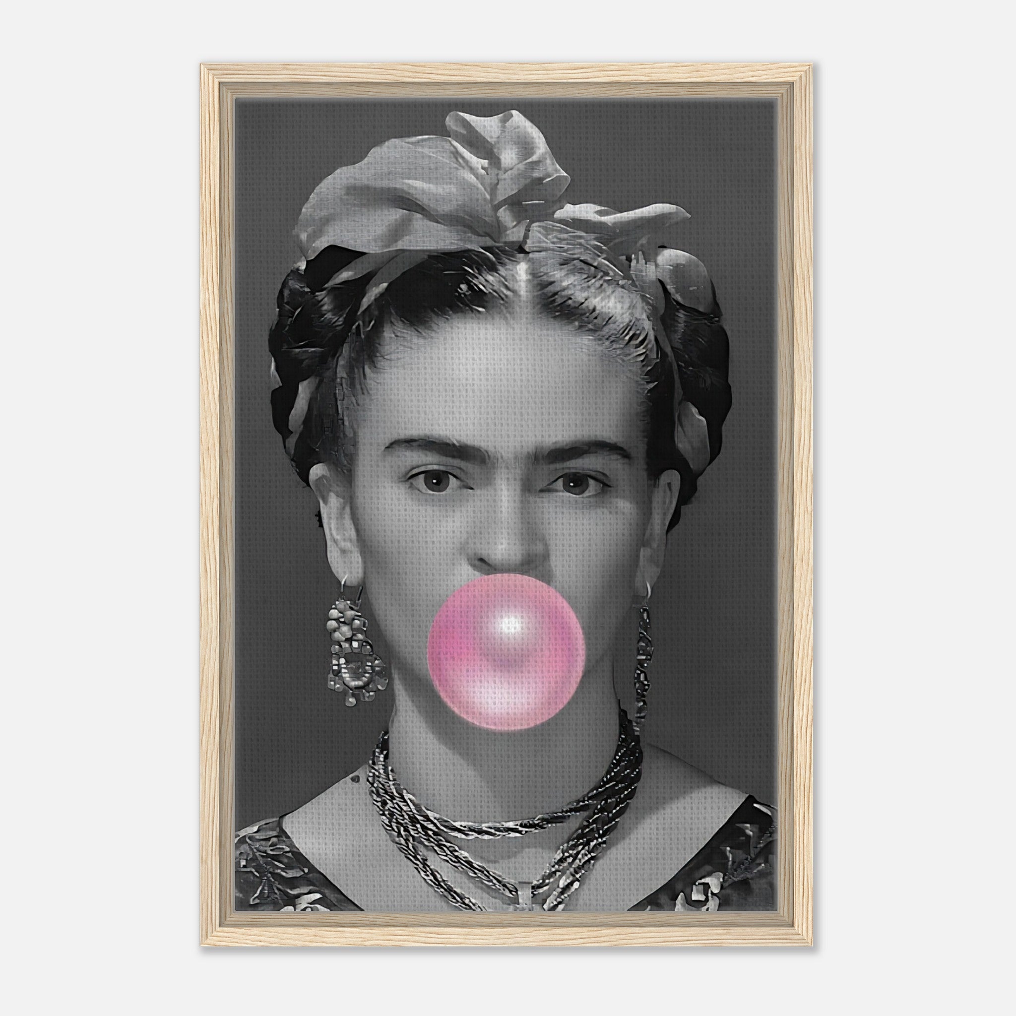 Frida Kahlo Bubble Gum framed canvas print featuring a grayscale portrait with pink bubble gum.