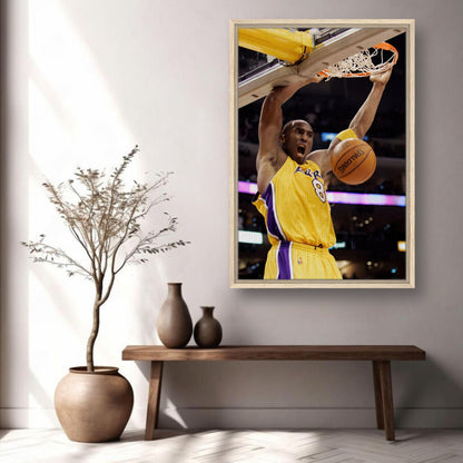 Kobe Bryant's iconic slam dunk framed canvas print showcasing his electrifying energy and legacy in basketball.