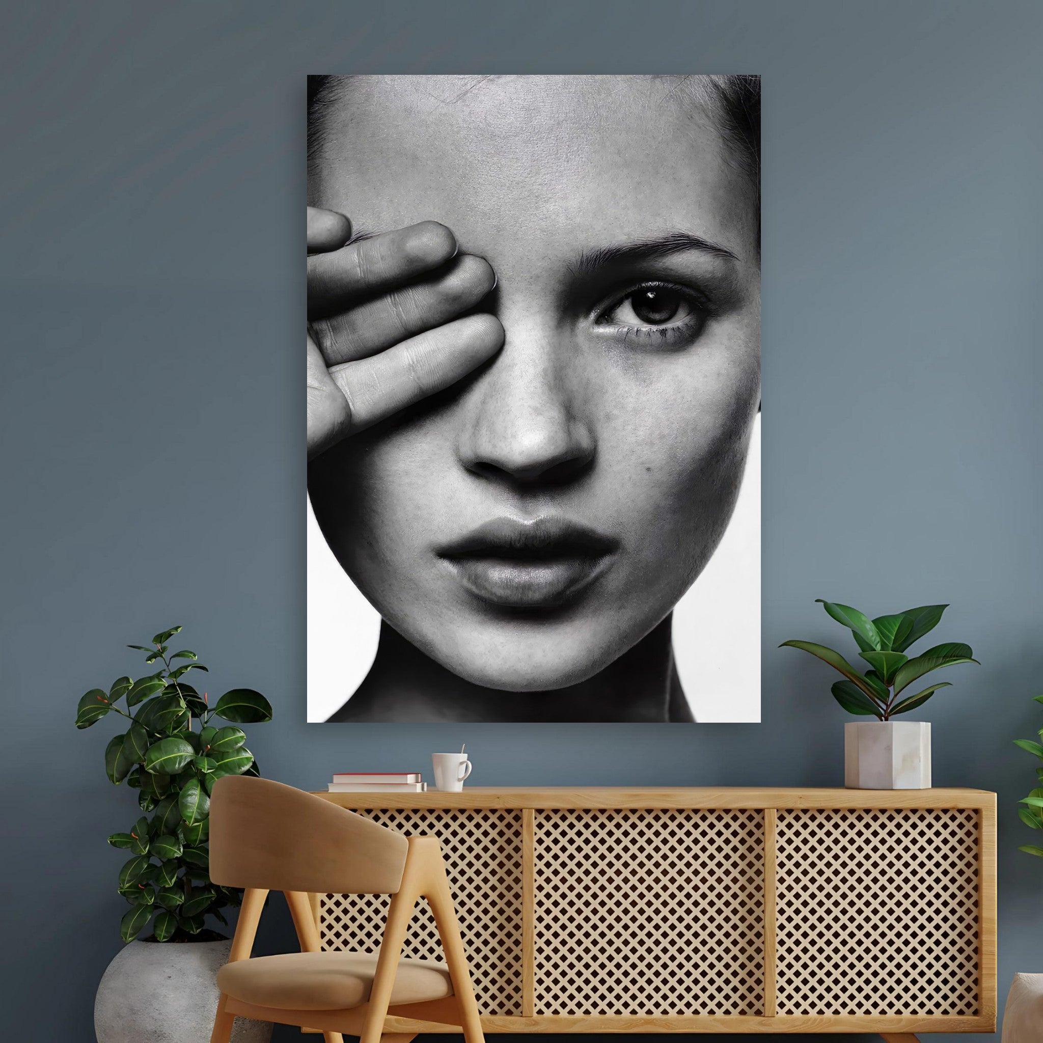 Black and white photography poster of Kate Moss, showcasing her iconic features and elegant style in modern decor.