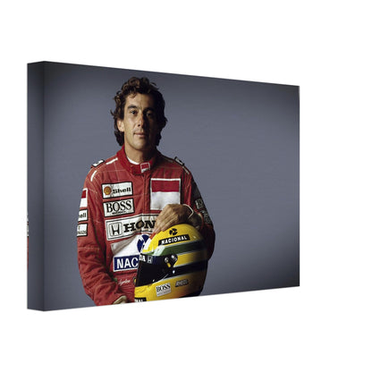 Ayrton Senna canvas print featuring the legendary racer in iconic red racing suit holding his helmet.