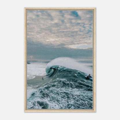 Big wave surfing framed canvas print showcasing a surfer riding a massive wave against a dramatic sky.