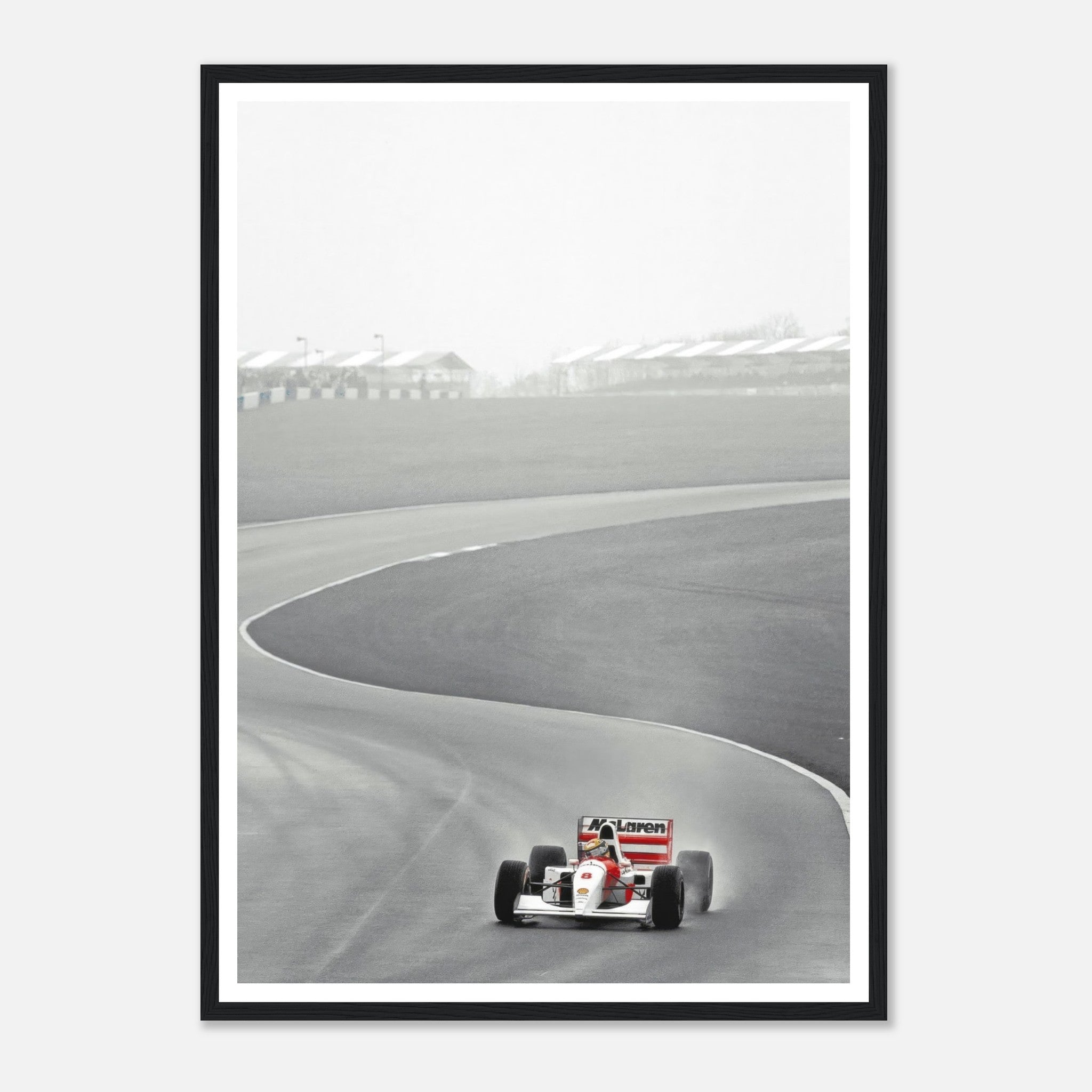 Black and white framed print of Ayrton Senna driving the McLaren MP4/4 during the 1988 Formula 1 season.