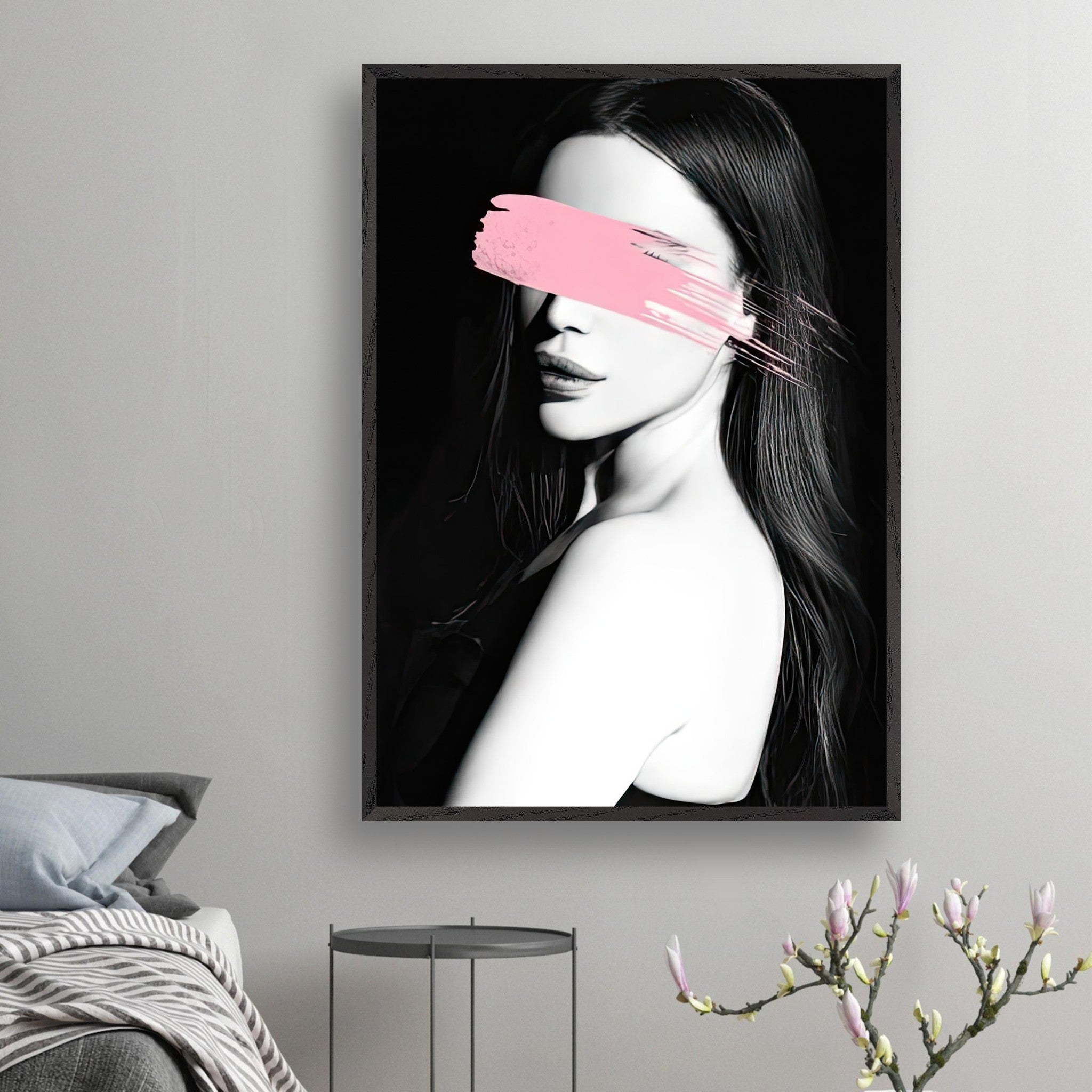 Vintage framed print of a woman with a pink brushstroke over her eyes, showcasing modern minimalism and striking color contrast.