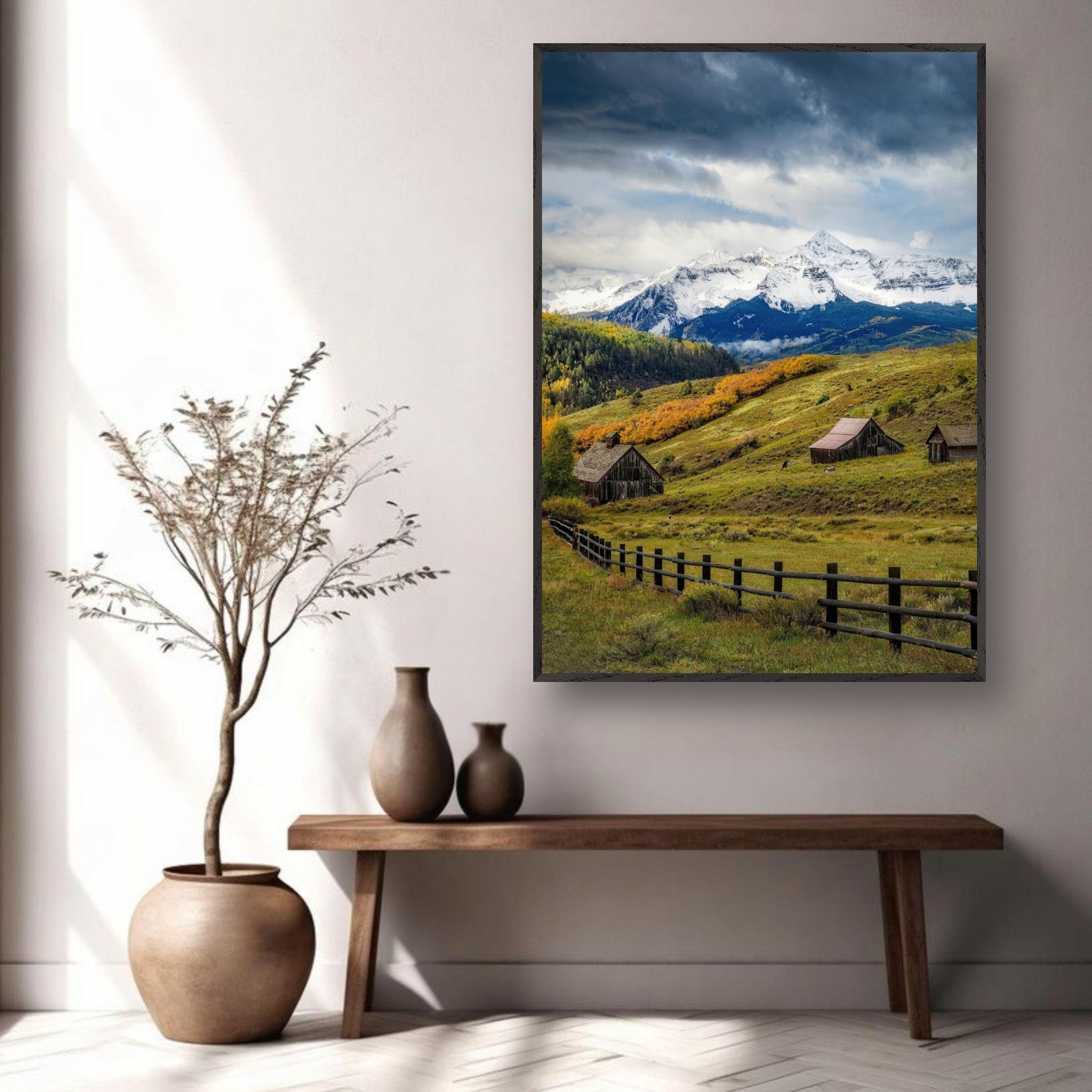 Framed Giclée fine art print of Telluride, Colorado featuring rustic barns and snow-capped peaks in a scenic landscape.