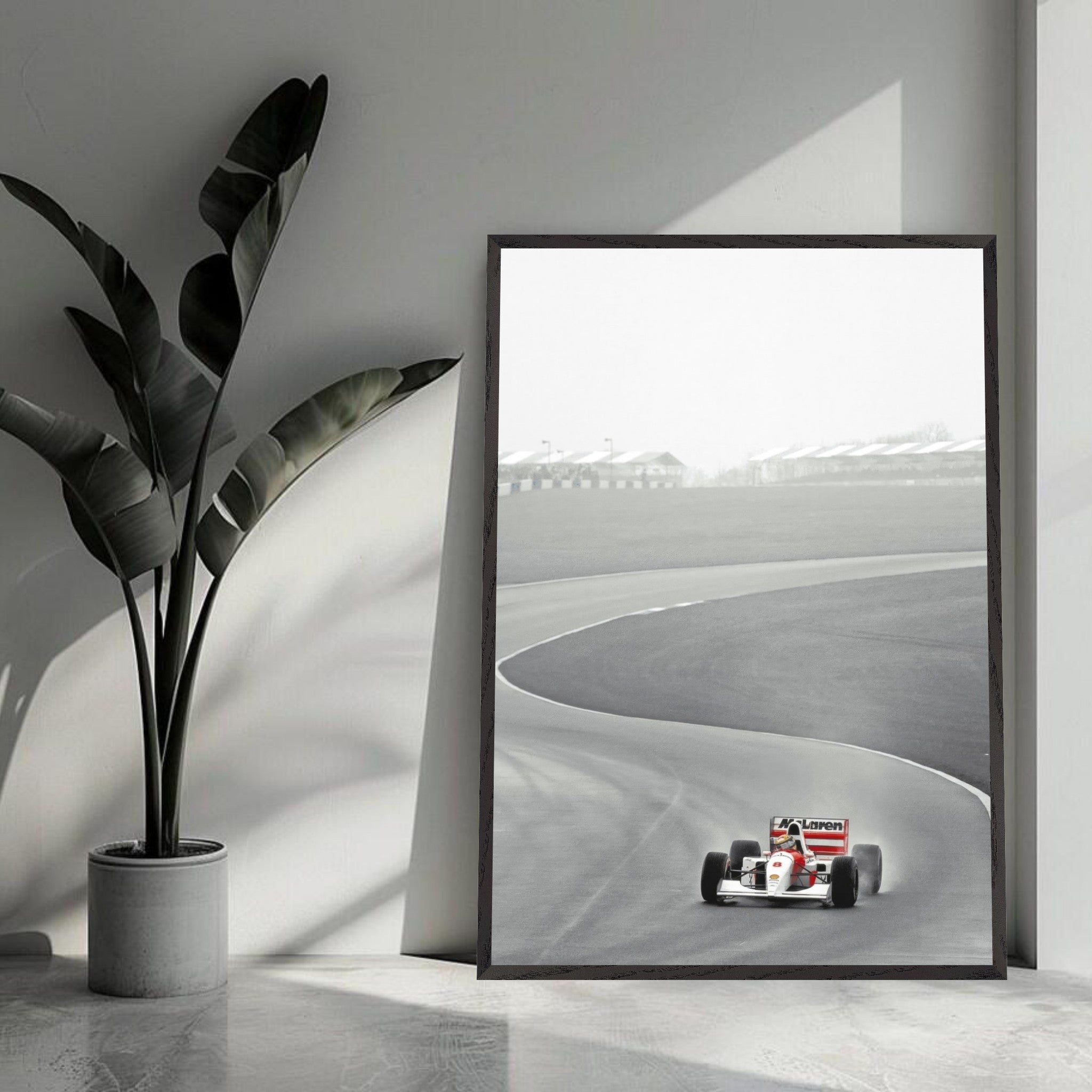 1988 Ayrton Senna McLaren MP4/4 framed vintage art capturing a Formula 1 moment on the track.