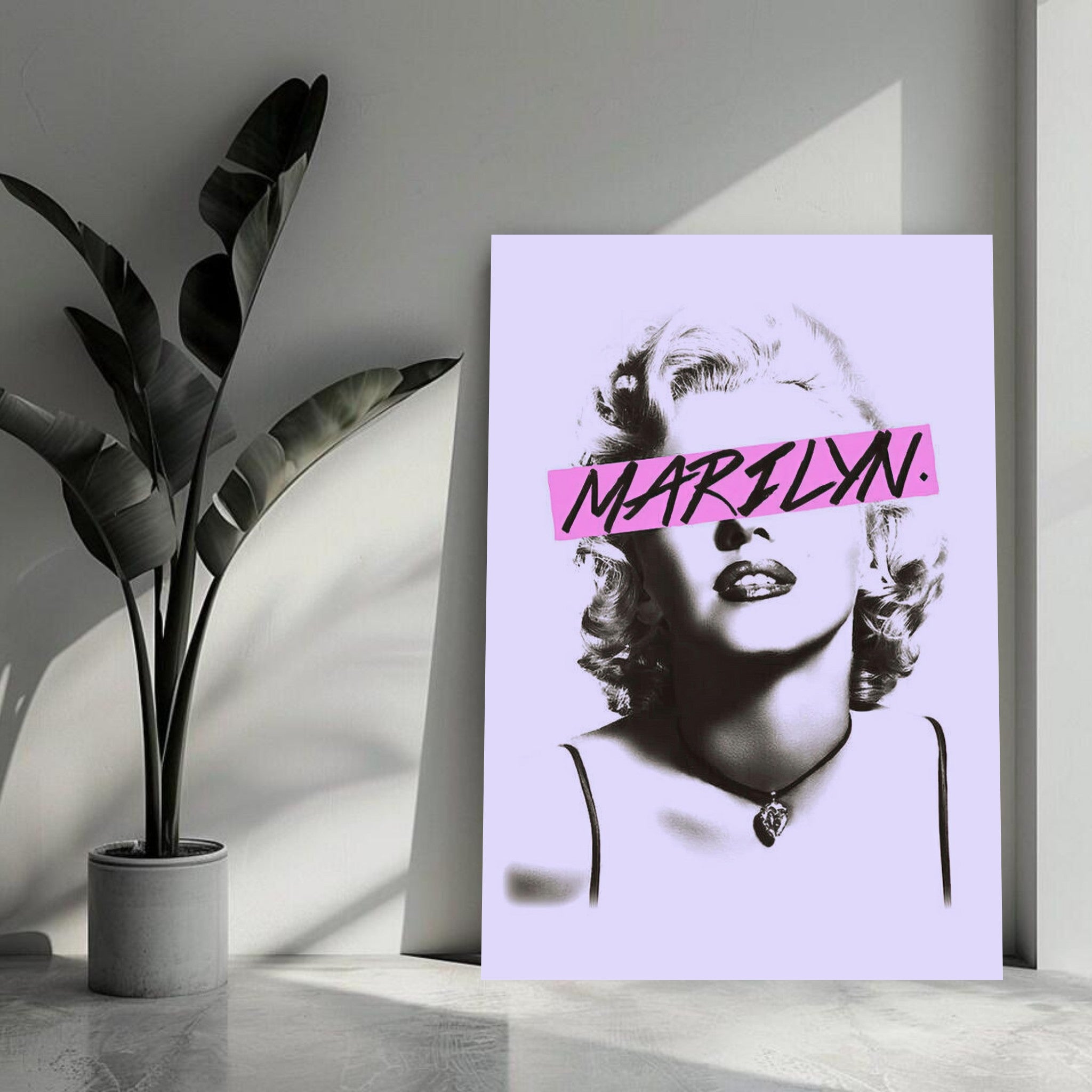 Marilyn Monroe metal poster featuring vibrant design and bold typography in a stylish interior setting.