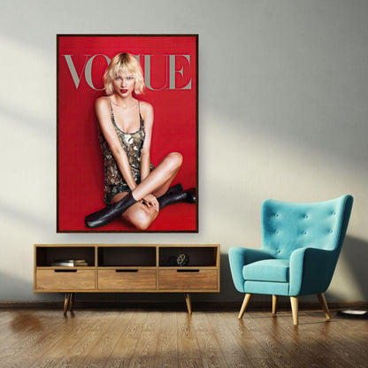 Taylor Swift Vogue framed poster showcasing elegance and star power with a striking red background. Perfect for fans.