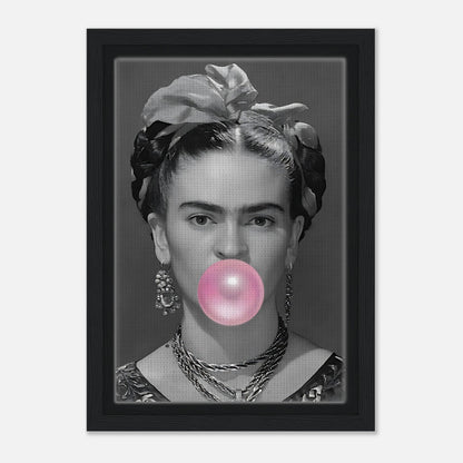 Frida Kahlo portrait blowing pink bubble gum in a framed canvas print with natural wood finish.