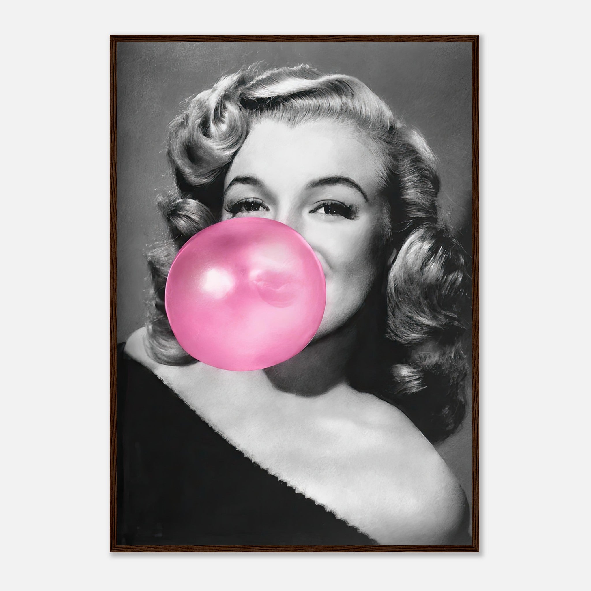 Marilyn Monroe framed print featuring the iconic actress blowing pink bubble gum, blending glamour with a playful twist.