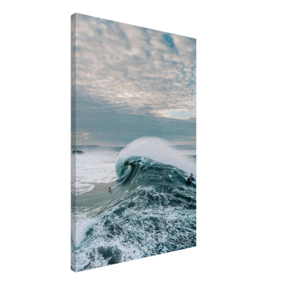 Big Wave Surfing canvas print showcasing a fearless surfer riding a massive wave with dynamic ocean energy.
