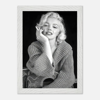 Marilyn Monroe in a vintage framed print, elegantly smoking while wearing a cozy sweater, exuding classic Hollywood glamour.