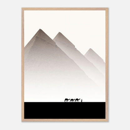 Framed art of the Pyramids of Giza with camels and a guide against a muted sky, showcasing travel photography elegance.