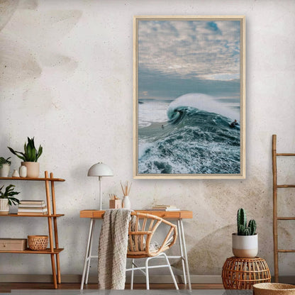 Big Wave Surfing Framed Canvas Print showcasing a surfer riding a massive wave in a modern living space.