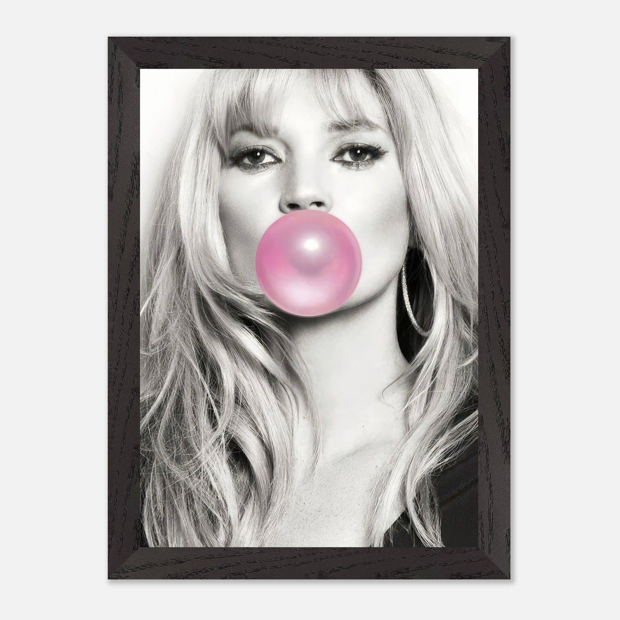 Vintage framed print of a woman blowing pink bubble gum, capturing cool elegance in black and white.