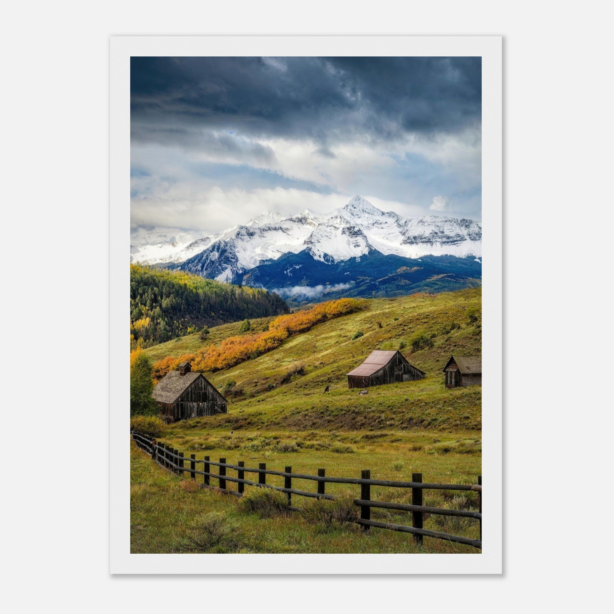 Stunning Telluride framed print showcasing snow-capped mountains and rustic barns in vibrant fall colors.