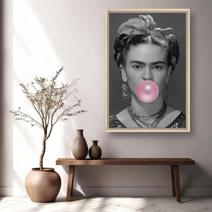 Frida Kahlo Bubble Gum framed canvas print in living room, featuring grayscale portrait and pink bubble gum.