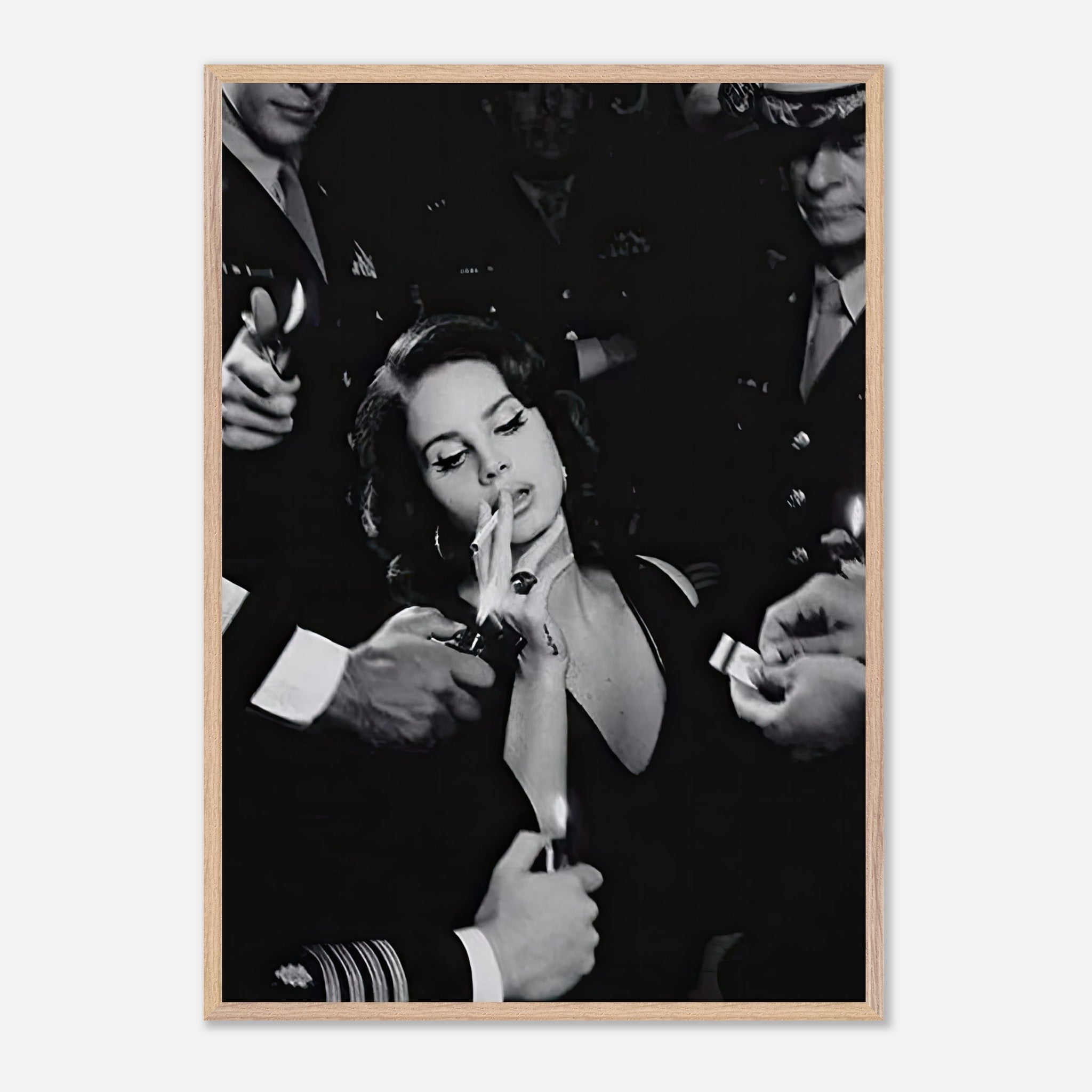 Black and white vintage print of a woman smoking surrounded by men in military uniforms, exuding elegance and charm.