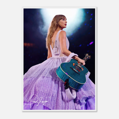 Taylor Swift framed poster showcasing her in a lavender gown with a guitar, perfect for fans and decor.