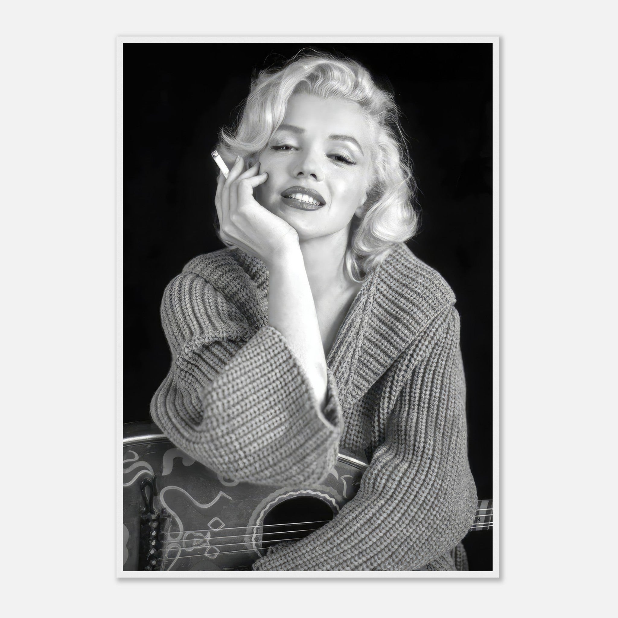 Marilyn Monroe Smoking in a cozy knit sweater, iconic black-and-white framed poster showcasing timeless elegance.