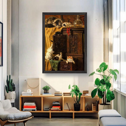 Vintage cat painting framed print of playful kittens on a wooden cabinet in a cozy living room.