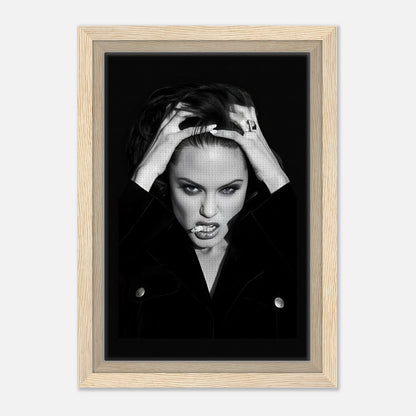 Angelina Jolie framed canvas print showcasing an elegant yet rebellious portrait in black and white.