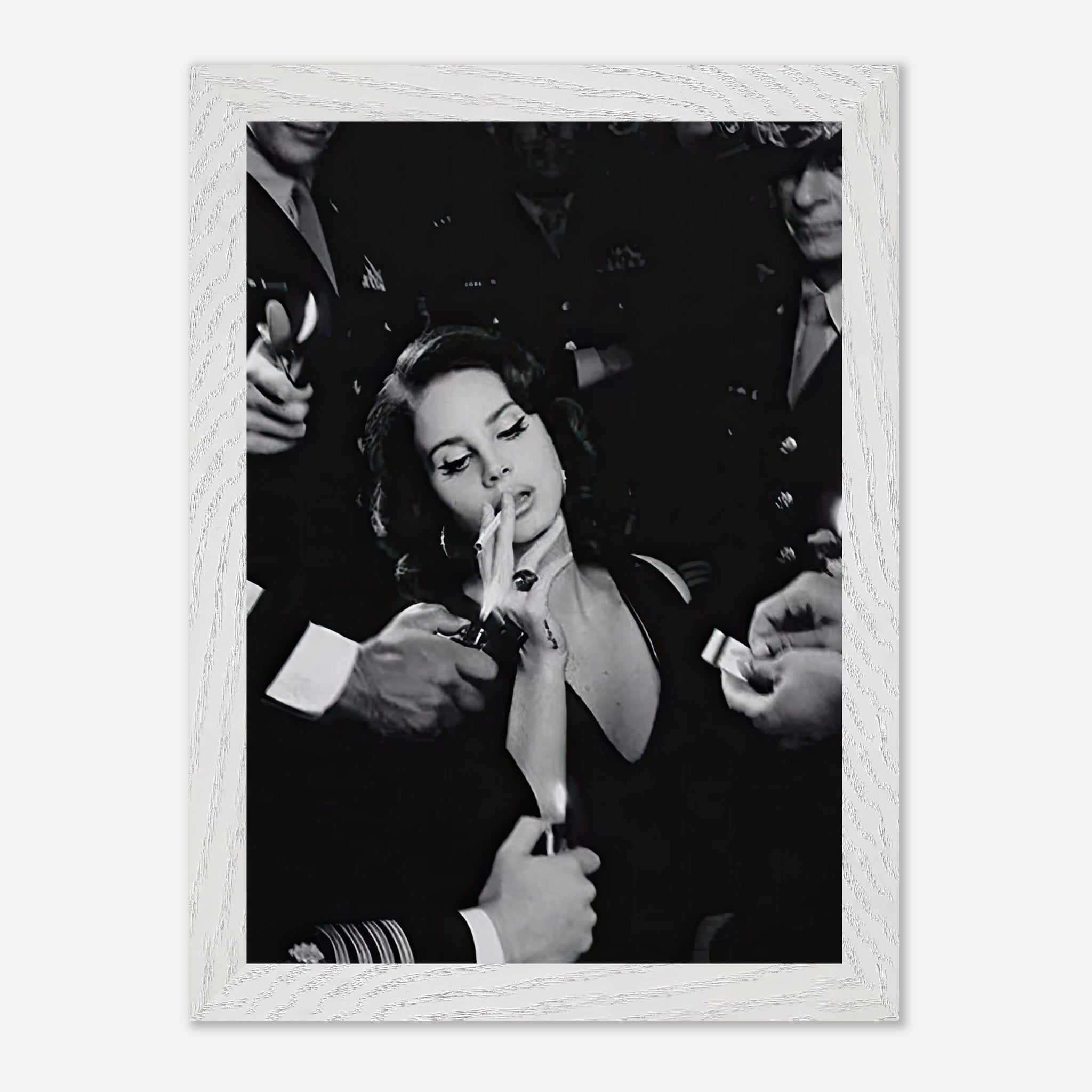 Lana Del Ray smoking in a vintage black-and-white photograph, surrounded by admirers, exuding timeless charm and elegance.