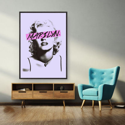 Vintage framed print of Marilyn Monroe with bold pink graphic detail in a stylish living room setting.