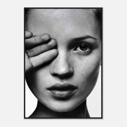 Kate Moss striking black and white portrait, highlighting her elegant features and intense gaze in a framed print.