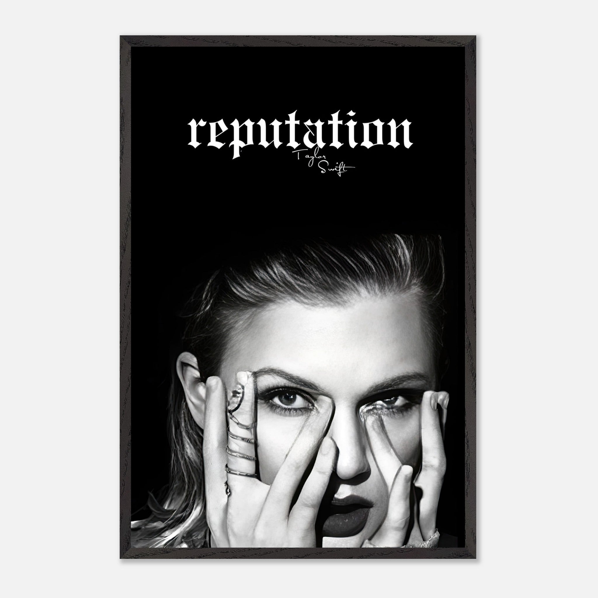 Taylor Swift Reputation vintage framed print featuring a striking monochrome portrait and bold logo. Perfect for fans.