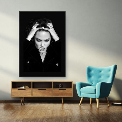 Angelina Jolie Smoking framed print displayed in a modern living room with teal chair and wooden furniture.