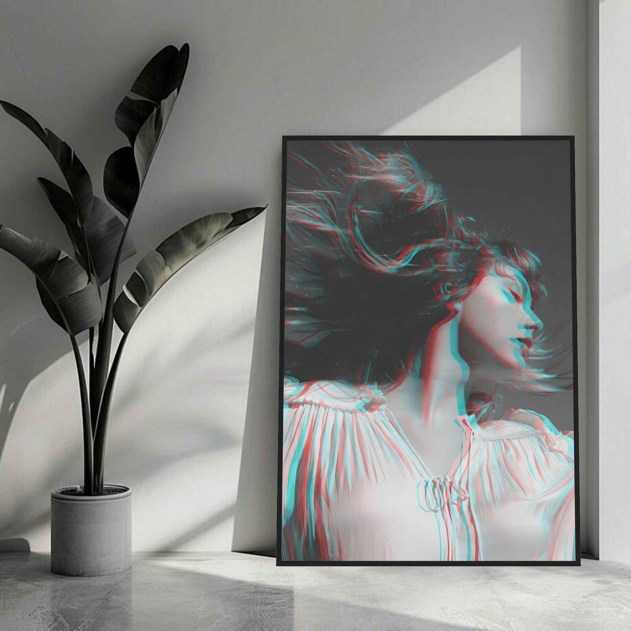 Taylor Swift black and white framed print with 3D accents, showcased in a modern interior setting with a plant.