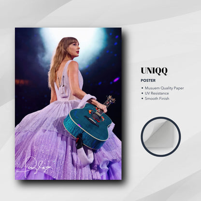 Taylor Swift Poster showcasing her in a lavender gown with a teal guitar, perfect for fans and collectors.