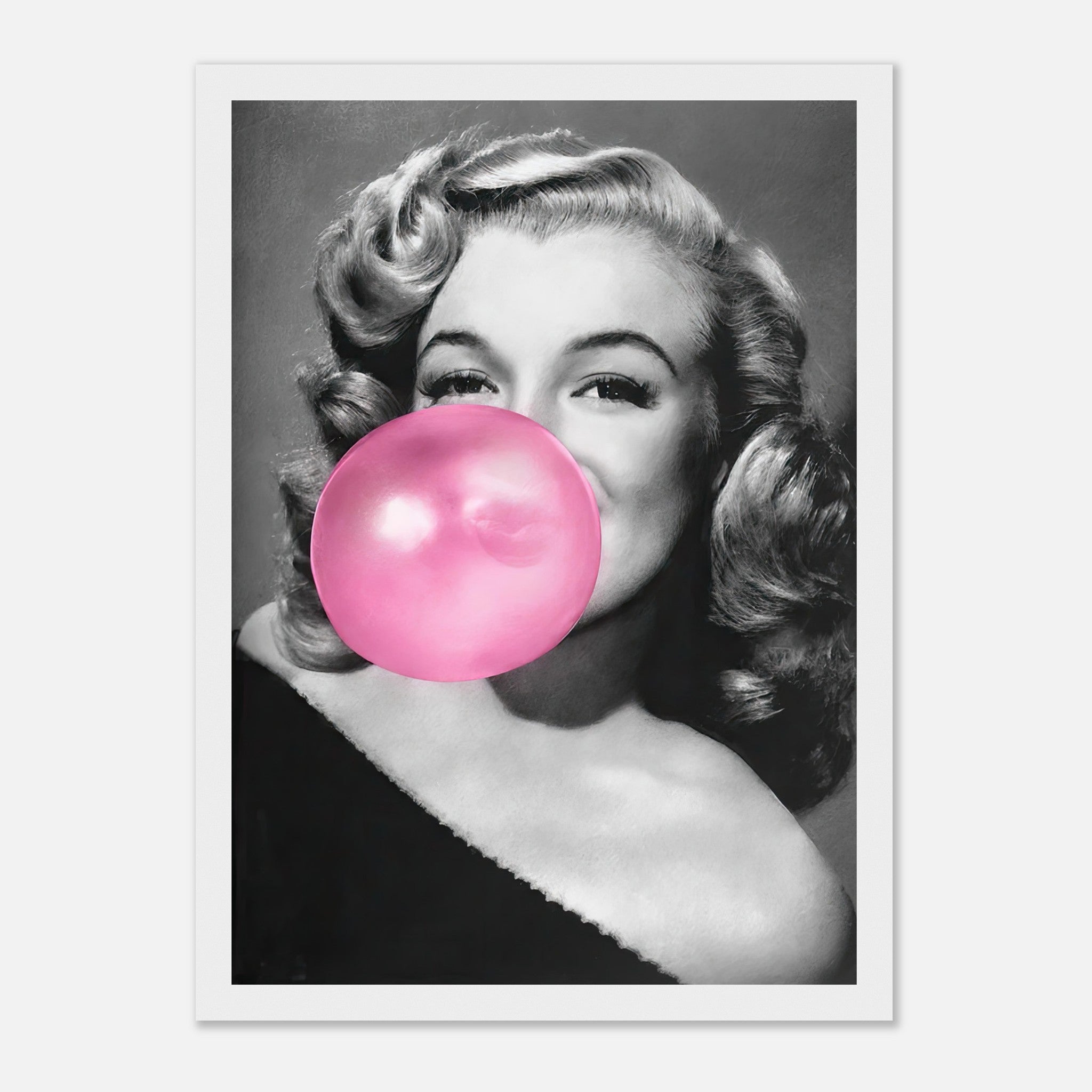 Marilyn Monroe blowing pink bubble gum in a classic black and white framed print, adding a touch of glamour to any decor.