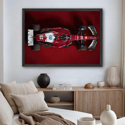 Ferrari F1 2025 fine art print displayed in a modern living room, showcasing its striking red design and museum-quality framing.
