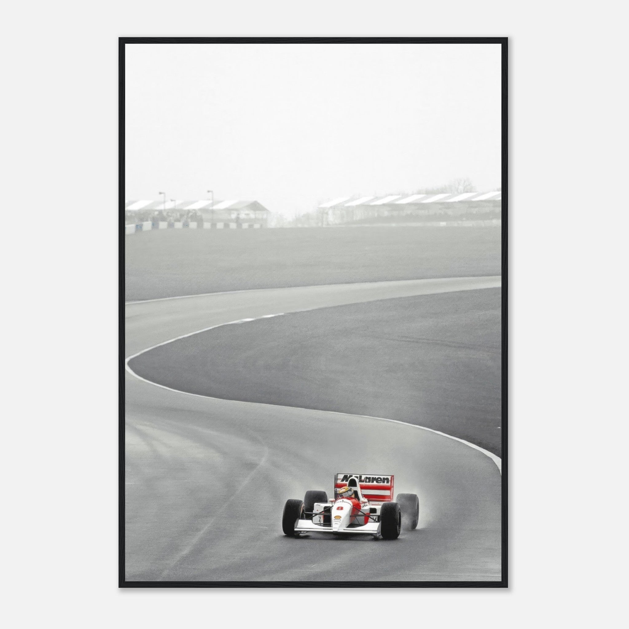 1988 Ayrton Senna McLaren MP4/4 framed print showcasing racing legacy on the track in black and white.