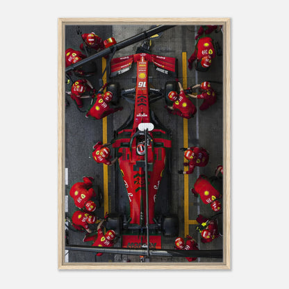 Ferrari Formula 1 pitstop framed canvas print capturing a thrilling moment with vibrant colors and dynamic design.