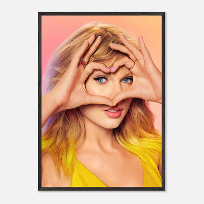 Vintage framed print of Taylor Swift making a heart shape with her hands, showcasing vibrant colors and charm.