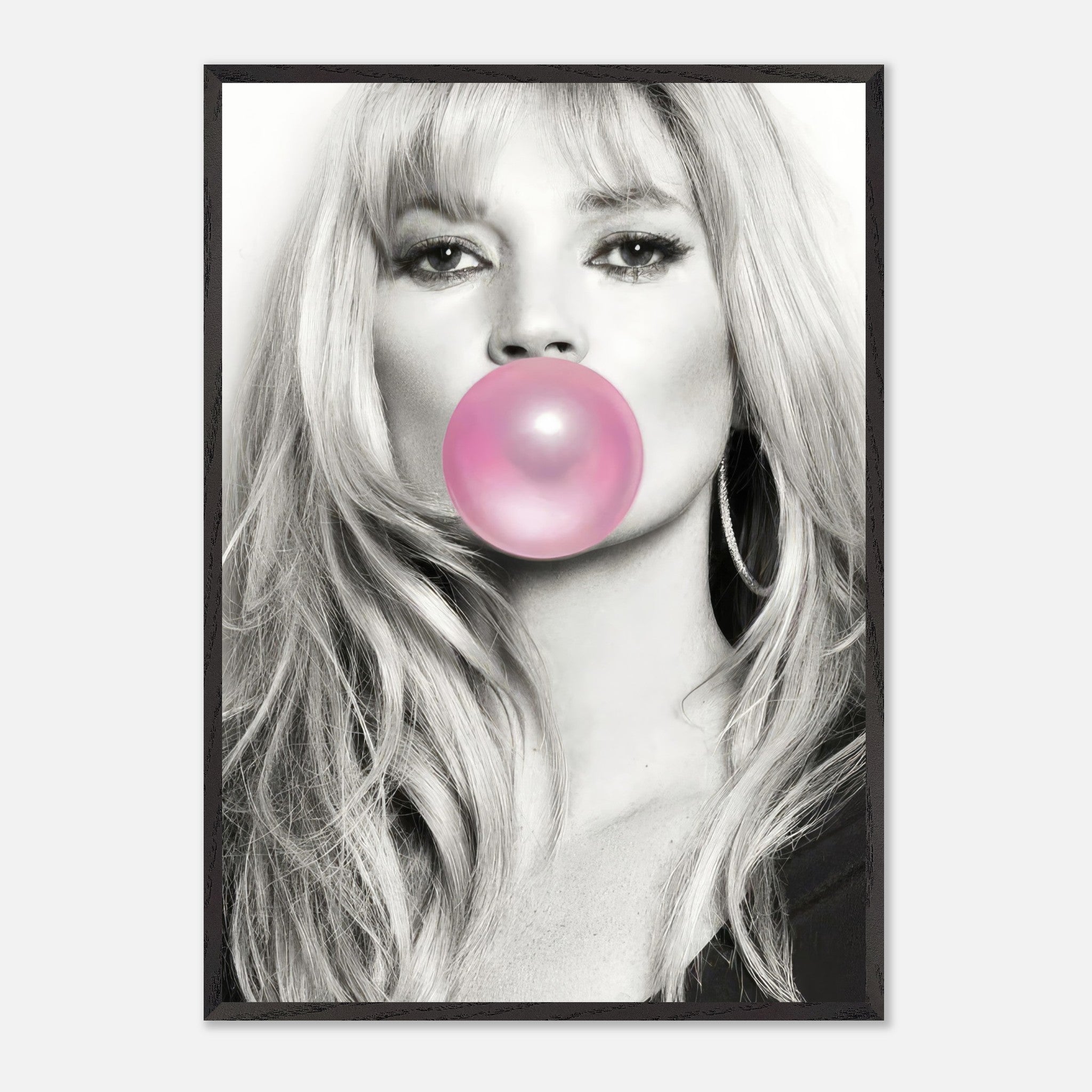 Vintage framed print of Kate Moss blowing pink bubble gum in a black-and-white portrait, perfect for modern decor.