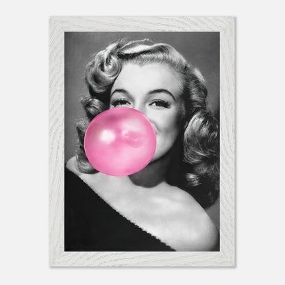 Marilyn Monroe vintage print blowing pink bubble gum in a stylish framed artwork.